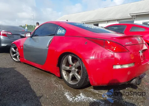 2003 Nissan 350Z Touring z USA, uszkodzony, nr VIN JN1AZ34E23T013078